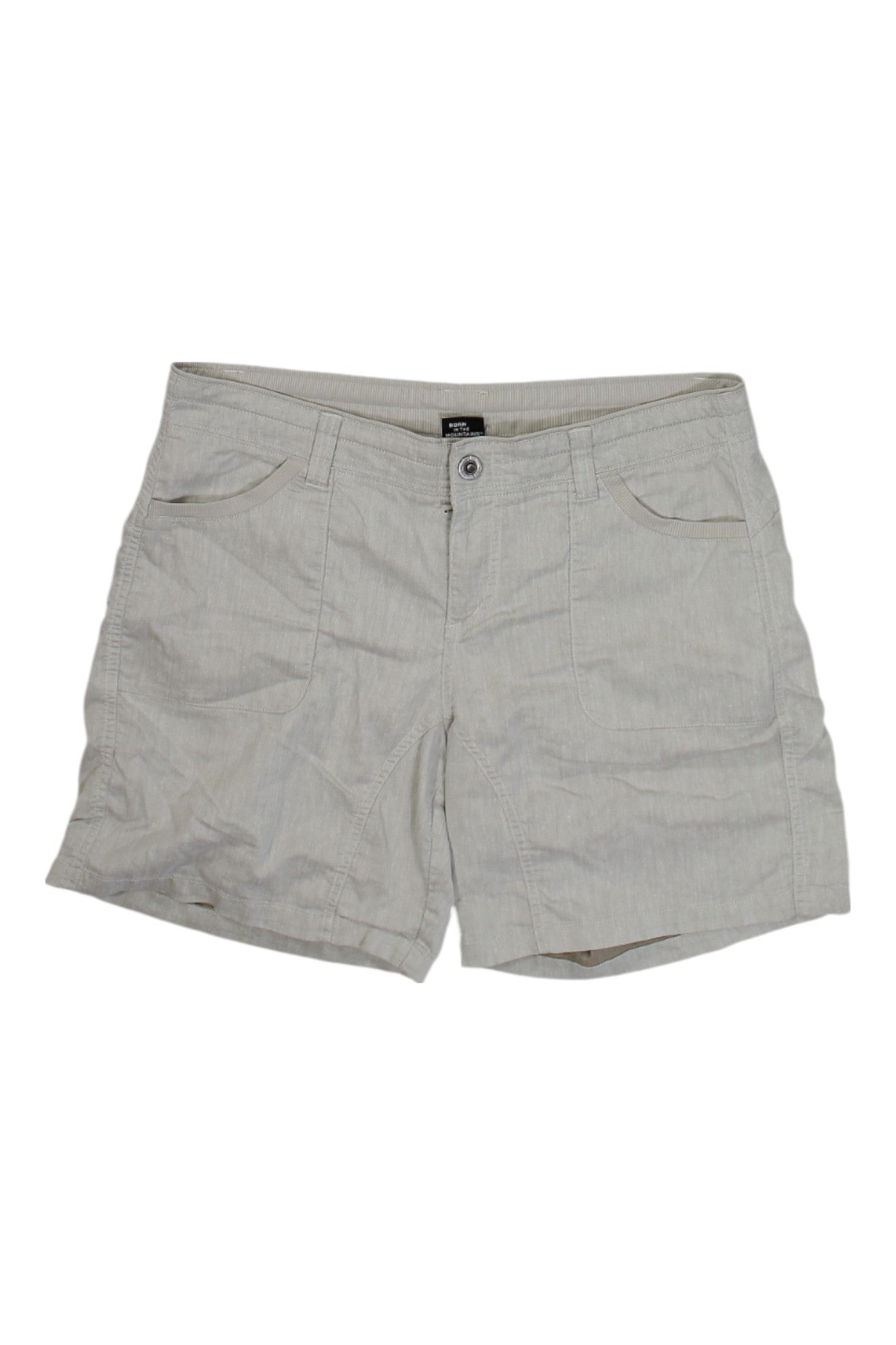 The Kuhl Womens Cabo Short is a light beige, knee-length hiking short for women featuring front pockets, button and zipper closure, and visible stitching details, shown on a plain white background.