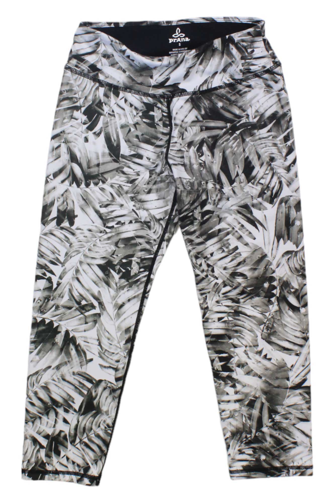 Womens Roxanne Capris: Fitted athletic leggings with a black and white abstract leafy print, made from micropoly performance jersey for optimal yoga comfort, shown flat on a white background.
