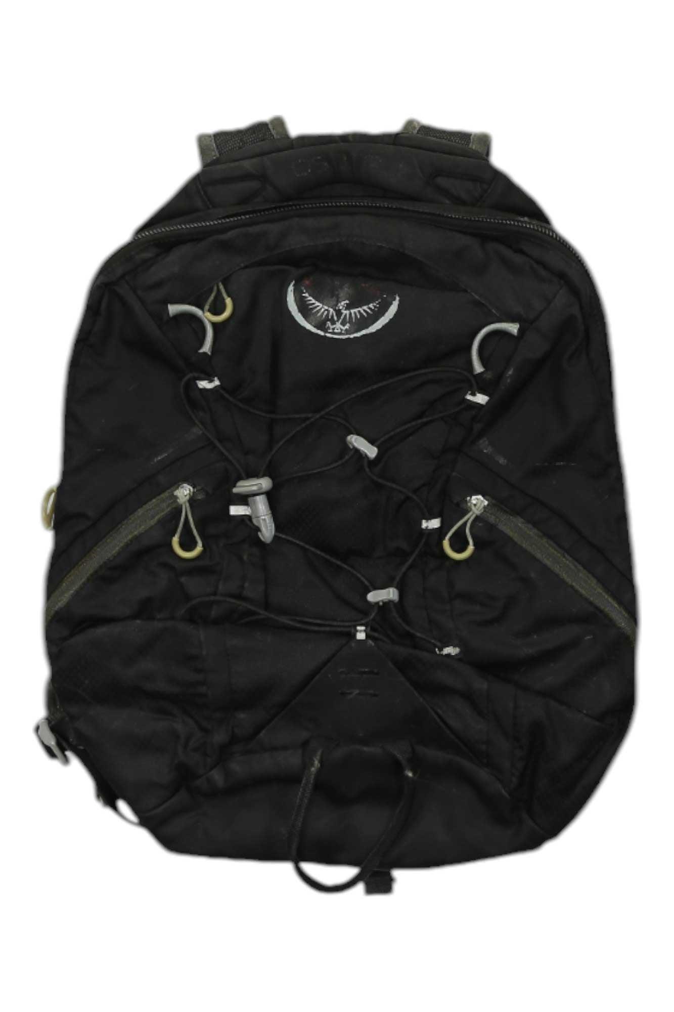The Osprey Quasar 24/7 Series 18L Laptop Backpack features a black, durable build, embroidered white logo near the top, gray zipper pulls, and an adjustable front bungee cord—perfect for daily use and shown against a white background.