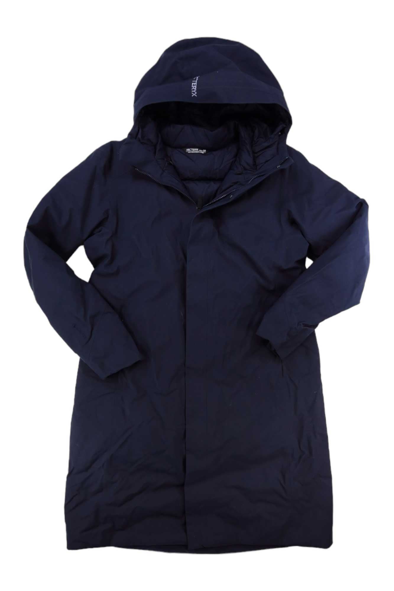 The Arcteryx Womens Patera Parka is a long, dark navy insulated jacket for women with a hood, long sleeves, front zipper, concealed snaps, and waterproof design, shown flat on a white background.