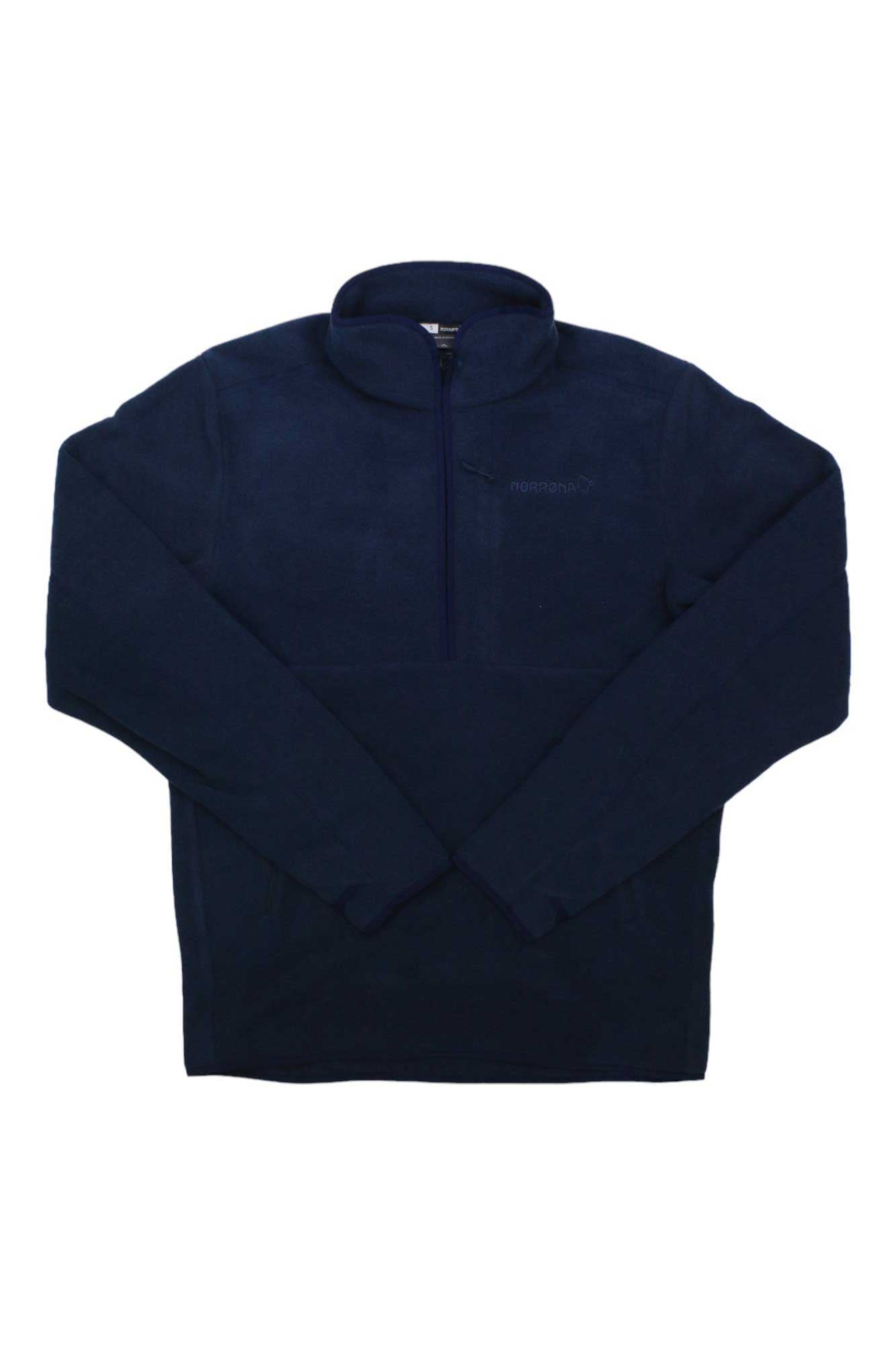 The Norrona Warm2 Halfzip Top in navy blue features long sleeves and a quarter-zip, made from recycled polyester fleece midlayer—perfect as an insulating outdoor layer. Shown laid flat on a white background.