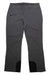 The Obermeyer Womens Malta Pant, shown in dark gray, features a zippered right thigh pocket, belt loops, black reinforced inner ankles, and insulated waterproof fabric, displayed flat on a white background.