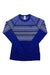 The Kari Traa Women's Silja LS Top is a royal blue, long-sleeve merino wool base layer with white geometric zigzag patterns on the chest, shoulders, and sleeves—ideal for cold weather. Displayed flat on a white background.