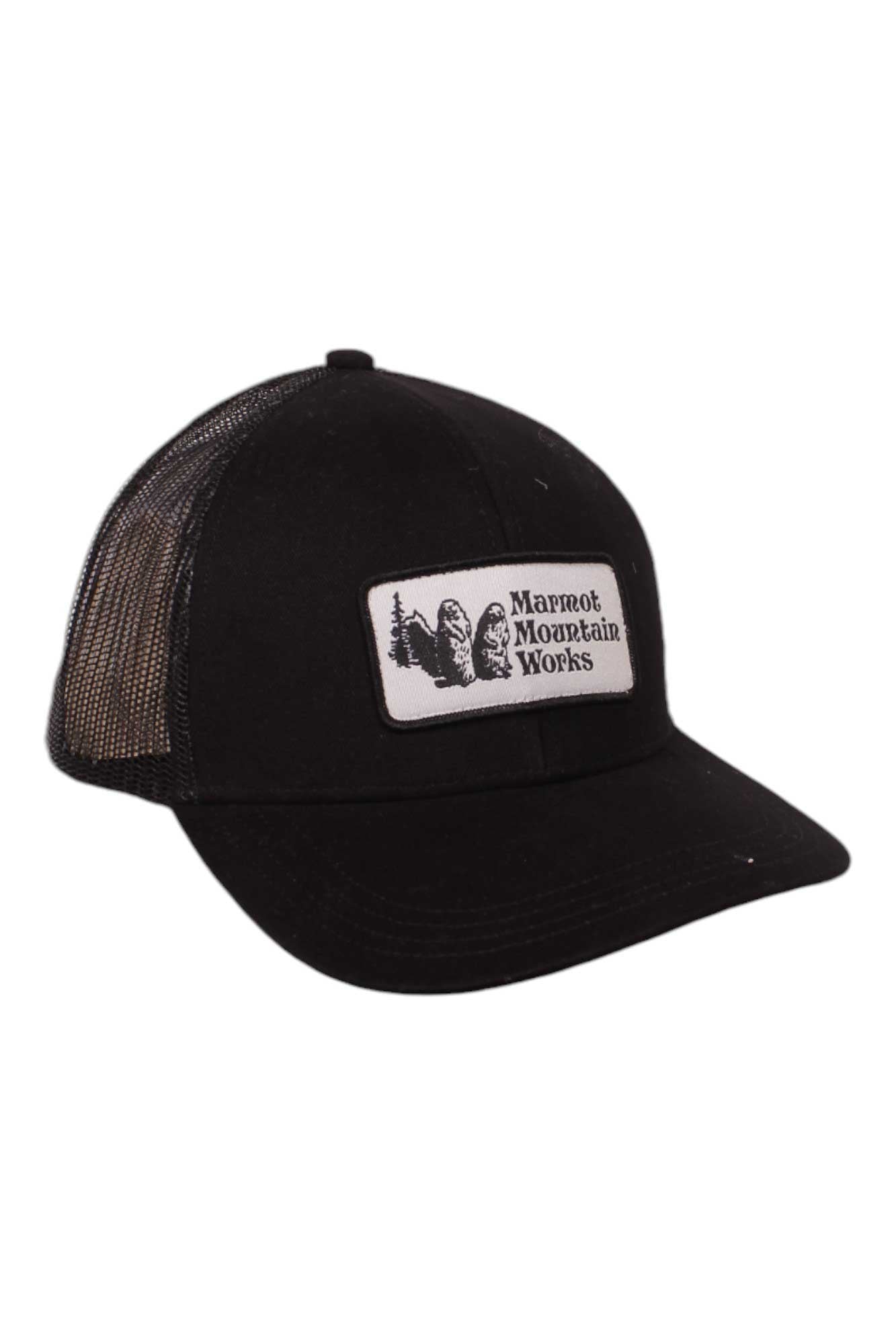 The Marmot Retro Trucker Hat features black mesh ventilation, a curved brim, and an adjustable snap-back. The front white patch shows Marmot Mountain Works text with a marmot and trees graphic.