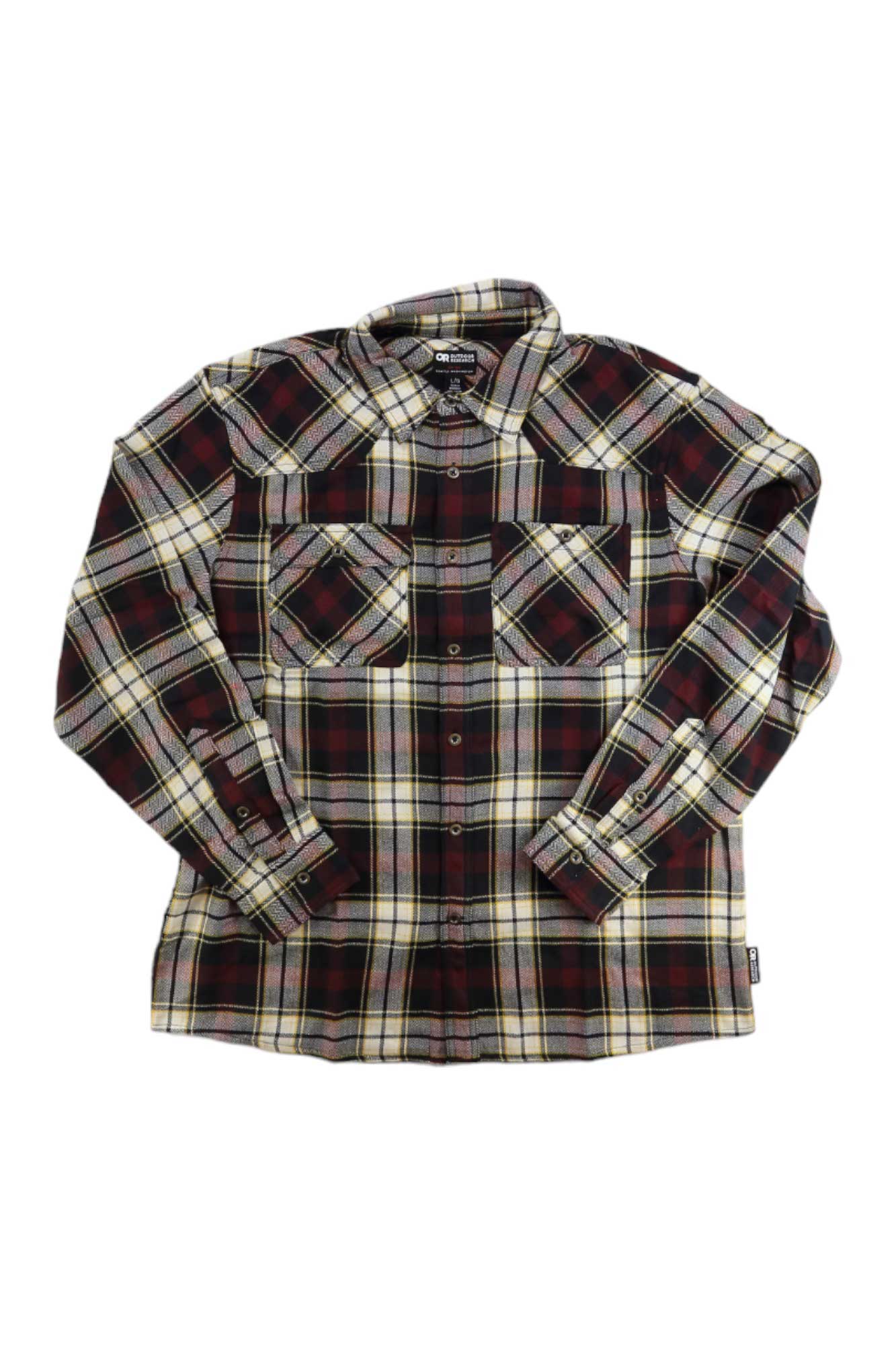 The Outdoor Research Men's Feedback Flannel Shirt features a black, red, yellow, and white plaid pattern, moisture-wicking fabric, long sleeves, button-up front, and two chest pockets with flaps and buttons.