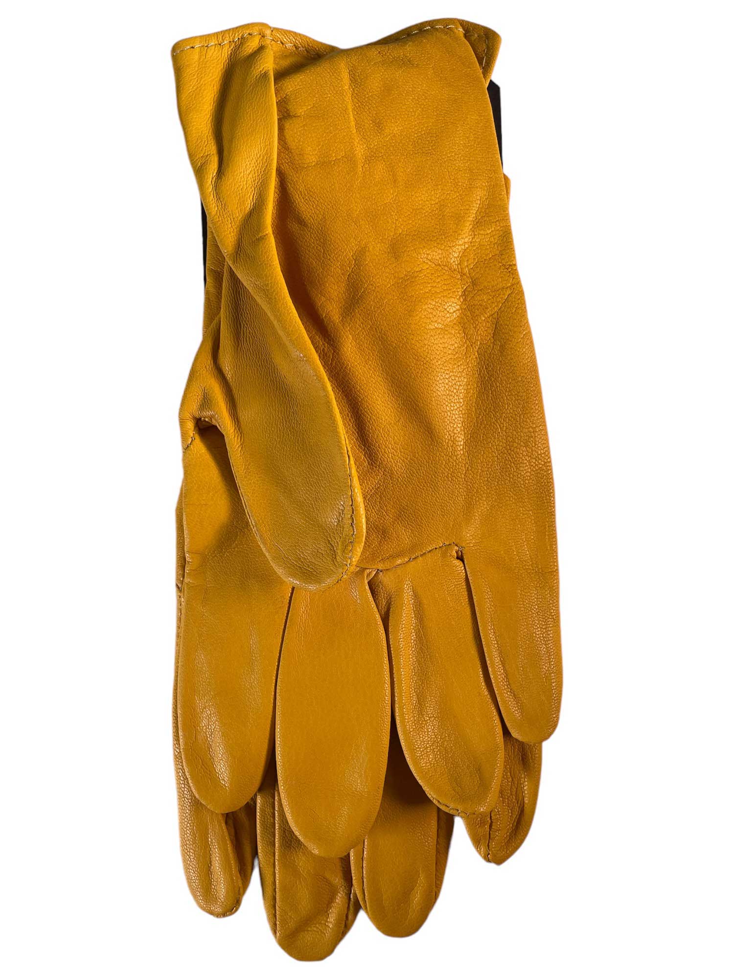 A pair of Filson Original Goatskin Gloves in yellow are stacked, one atop the other, highlighting their smooth goatskin leather texture and subtly worn look.
