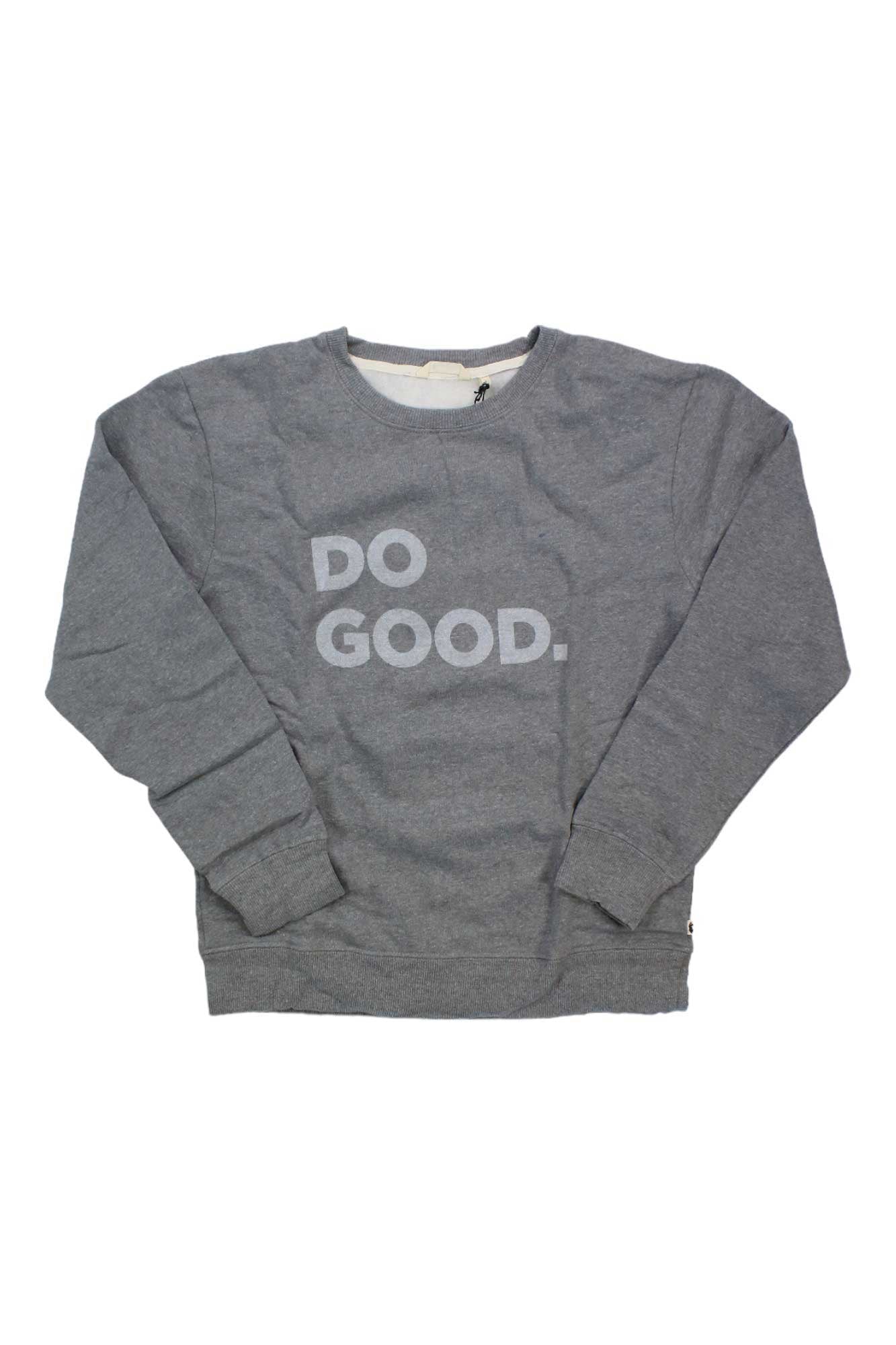 The Cotopaxi Women's Do Good Crew Sweatshirt in gray features "DO GOOD." in bold white text across the front. Made from an organic cotton blend, it's shown laid flat on a white background.