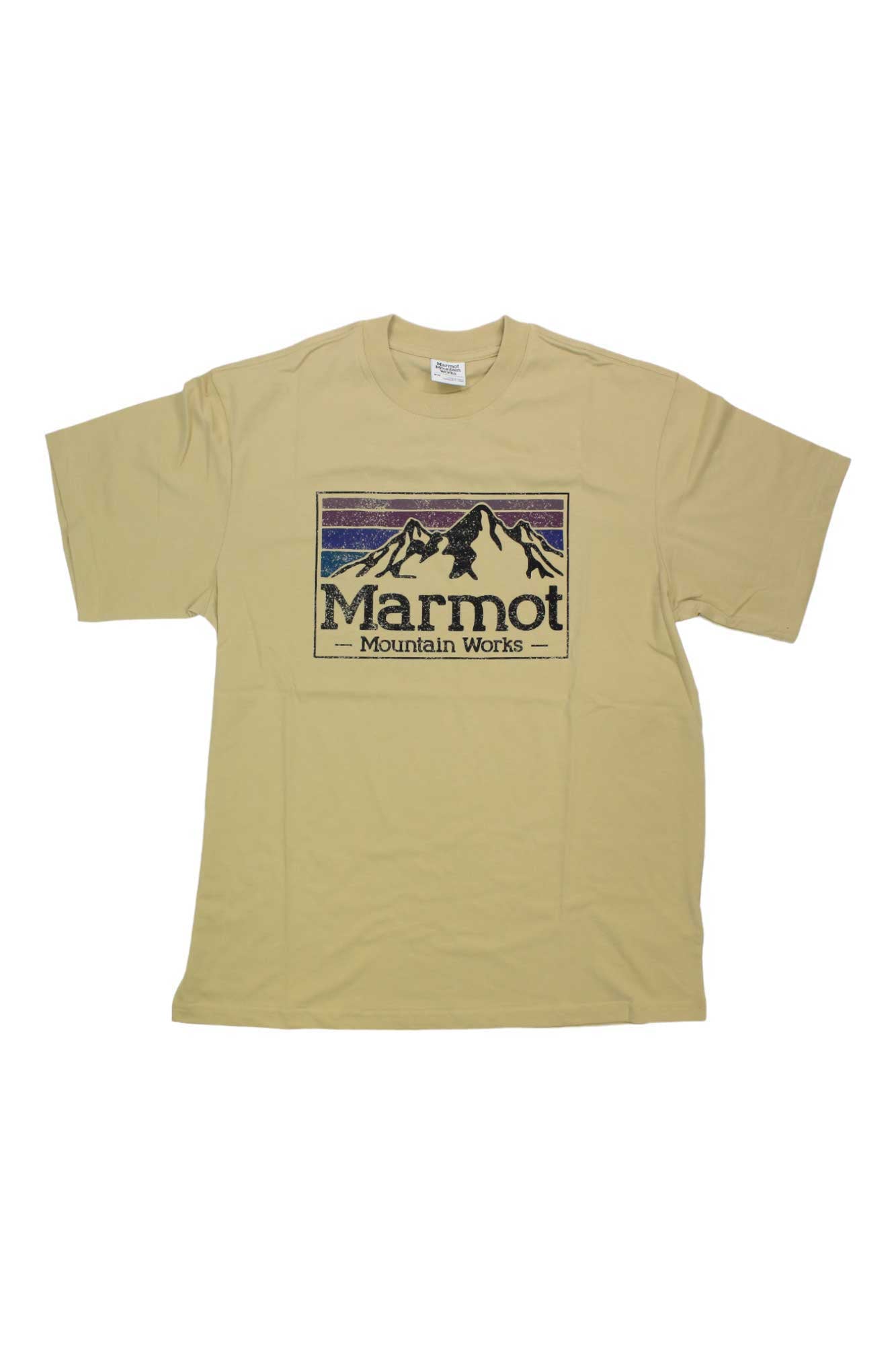 The Marmot Mens MMW Gradient SS Tee is a beige shirt with a rectangular mountain and hiker graphic plus "Marmot Mountain Works" text—crafted for comfort and outdoor performance.