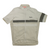 Light cream short-sleeve cycling jersey with full-zip front and gray reflective band detail.