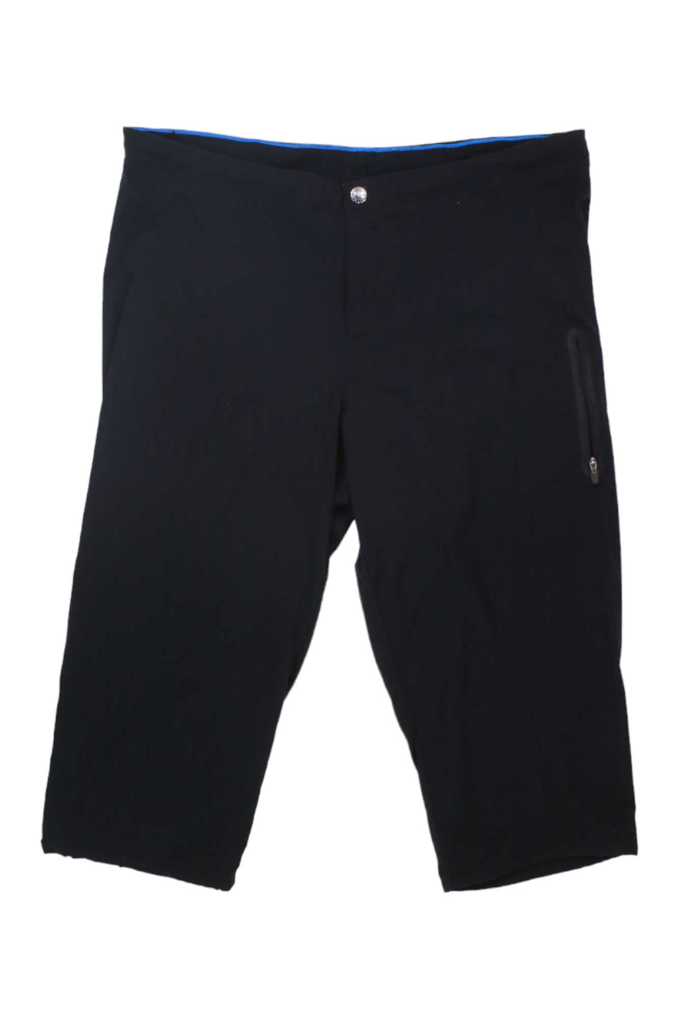 A pair of Columbia Womens Just Right II Capri Pants in black, featuring a button closure, zippered right pocket, and UPF 50+ sun protection, is displayed against a plain white background.
