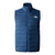 The North Face Women’s Belleview Stretch Down Vest is a blue, slim-fit layer with a front zipper, high collar, and white logo on the left chest. It features horizontal quilting, two side pockets, and is packable for easy adventures.