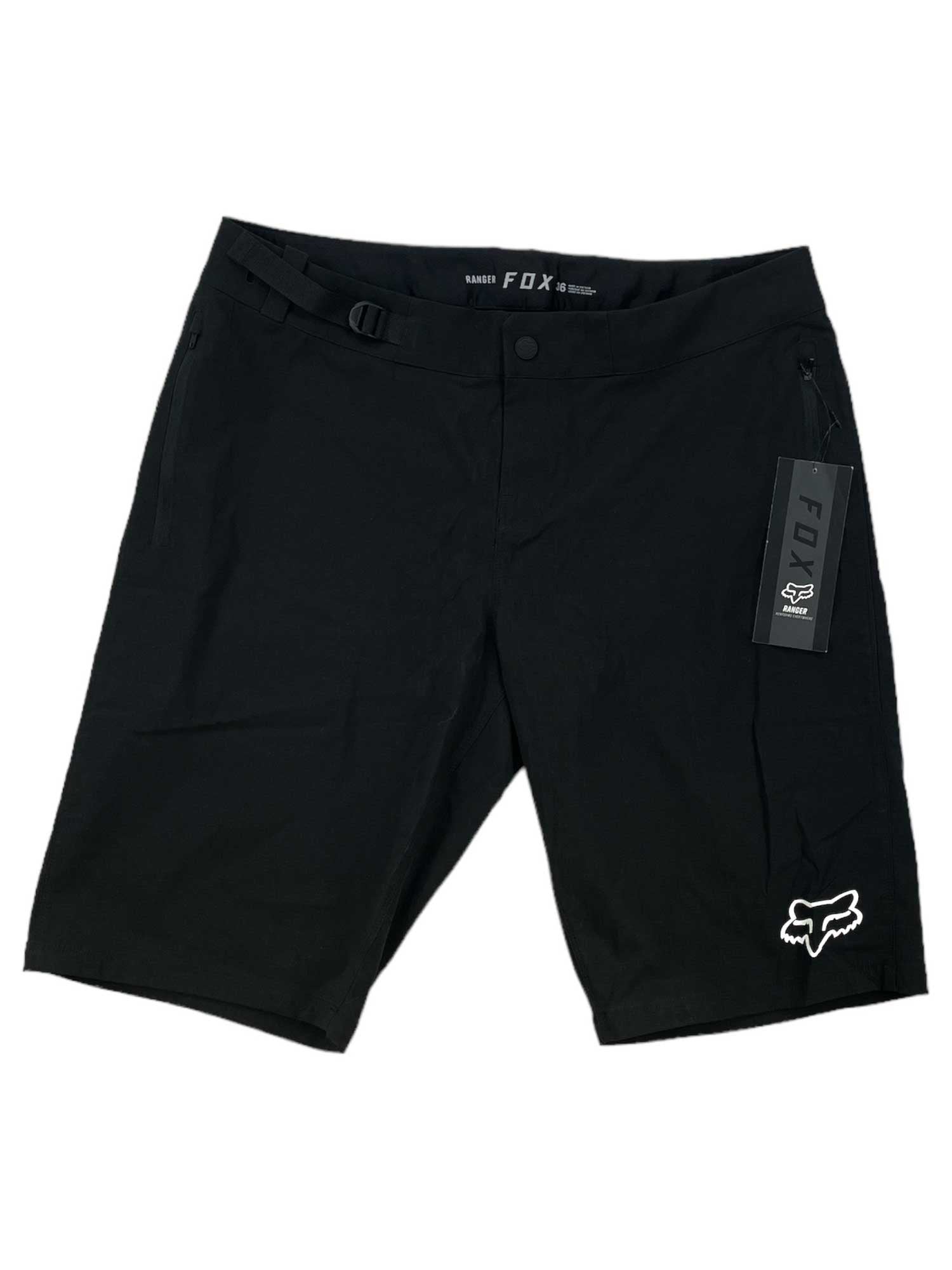 The Fox Mens Ranger Short is a black men's short with a small white Fox logo on the left leg, zipper pocket on the right, and Fox tag at the waistband—ideal for mountain biking or cycling adventures.