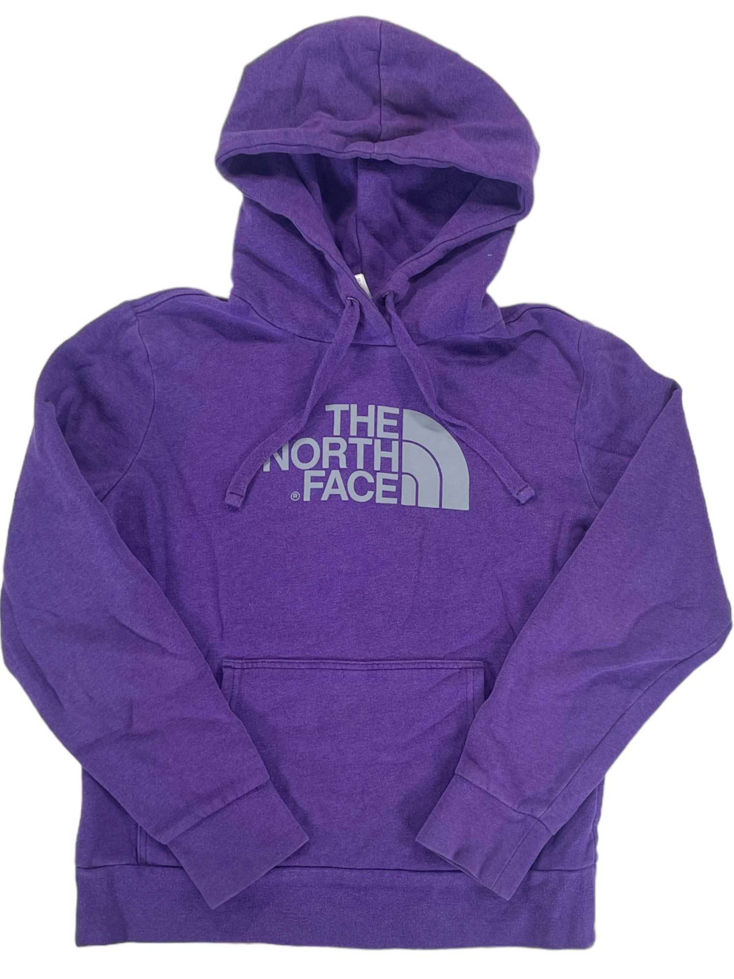 The Women's Half Dome Pullover Hoodie by The North Face is a purple pullover with a front pocket, drawstrings, and the brand’s white chest logo—an everyday classic for comfort and style.