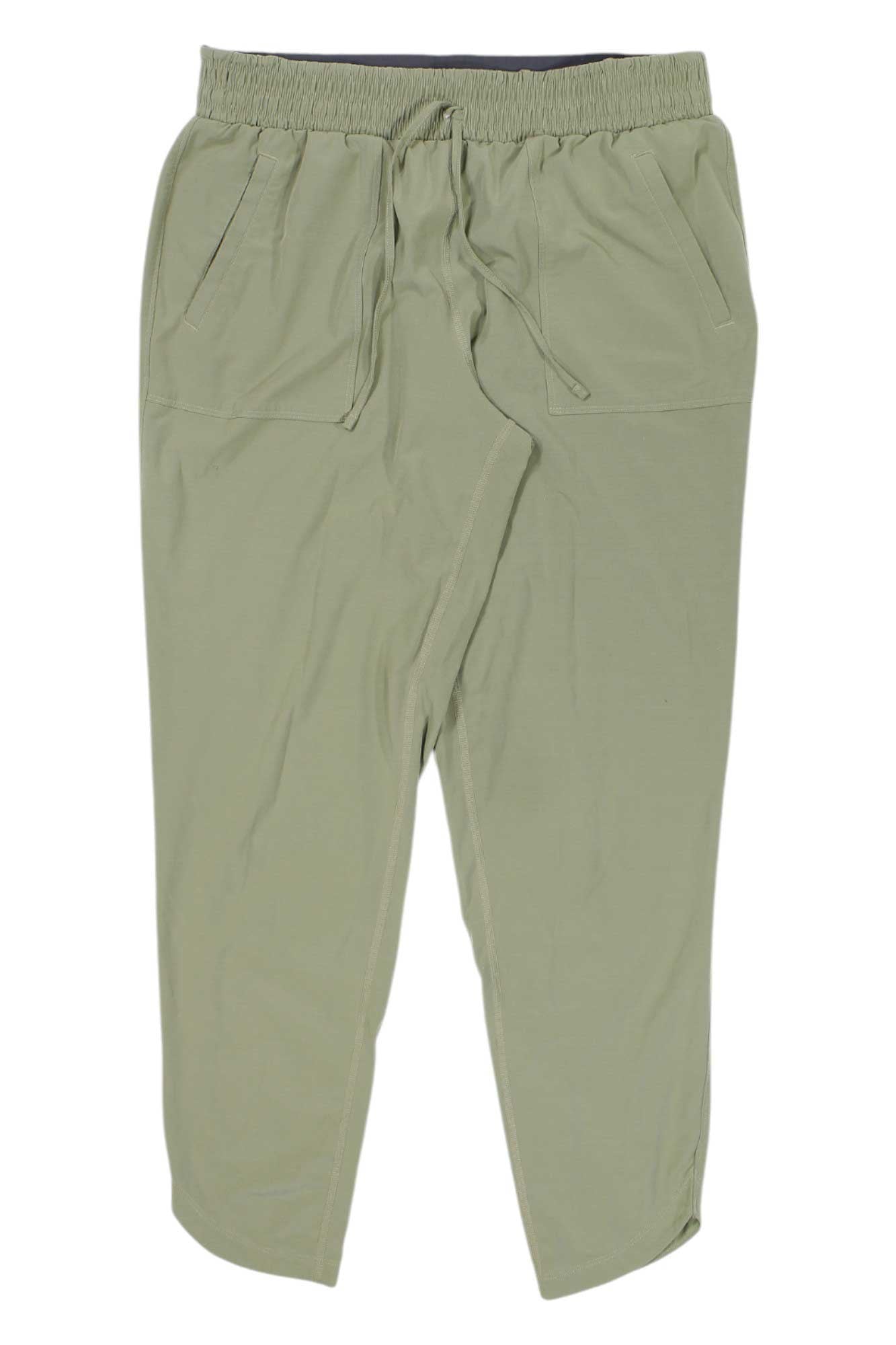 Light olive green Prana Womens Folgaria Pant featuring an elastic waistband, two front pockets, and slightly tapered legs—ideal activewear for women seeking both comfort and style.