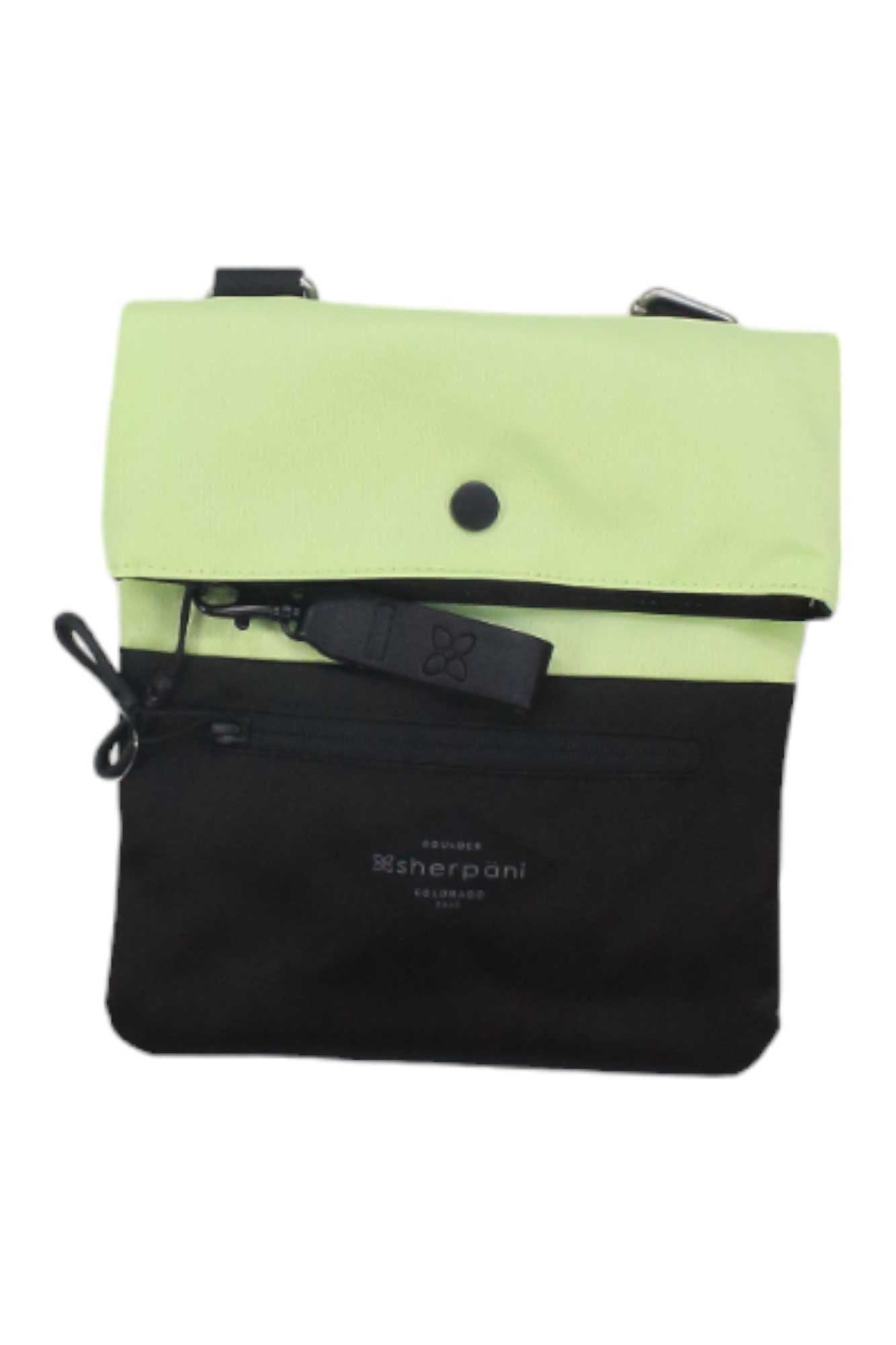 The Sherpani Womens Pica Cross Body Bag is a small bag with a light green flap, black bottom, zippered pocket, RFID-protected pocket, snap closure, adjustable strap, and front logo. Made from recycled materials.