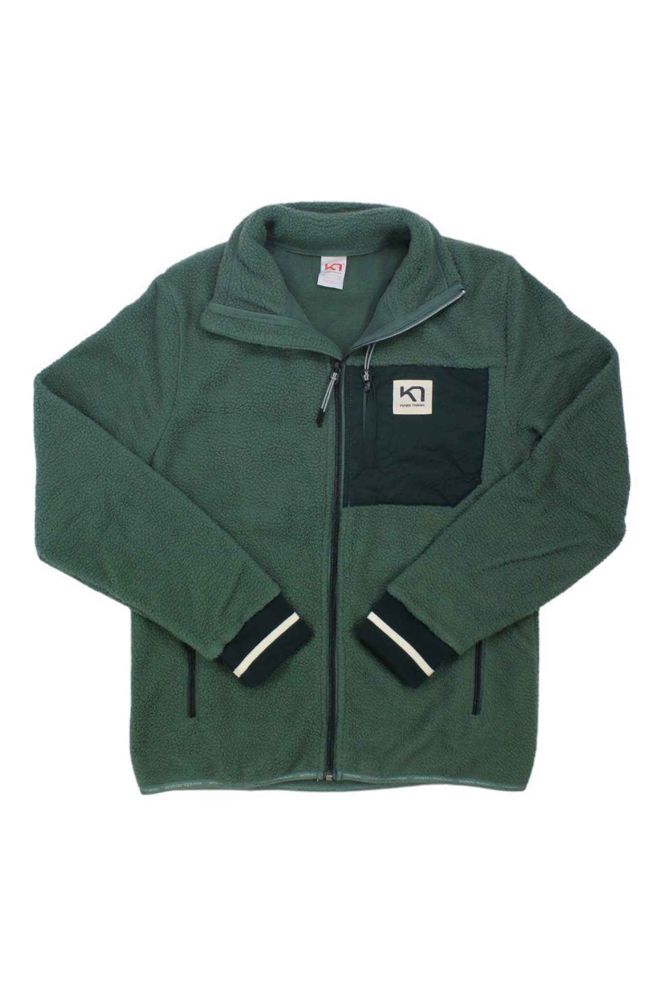 A green Rothe Fleece Jacket with a high collar, black zippered chest pocket, and black and white striped cuffs is laid flat on a white background; this women's snowsports jacket is bluesign approved.