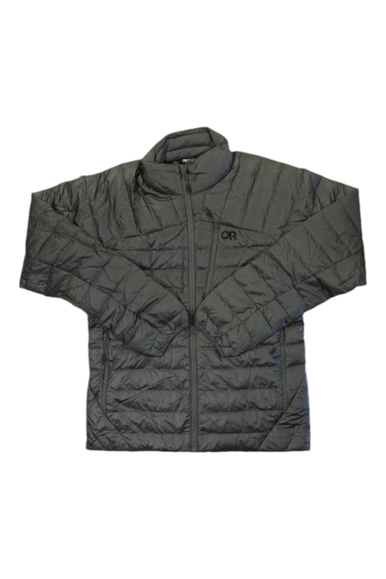 The Outdoor Research Men's Helium Down Jacket is a dark gray, lightweight insulated jacket featuring a front zipper, long sleeves, and an OR logo on the chest, shown laid flat on a white background.