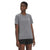 A woman wears The North Face Womens Wander SS Top, a grey UPF 50 short-sleeve hiking shirt, with black shorts. She stands against a white background and looks slightly to the side with a neutral expression.