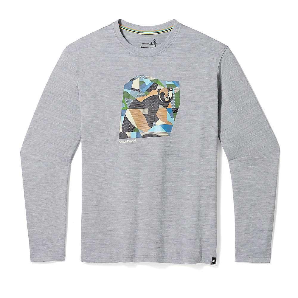 The Smartwool Bear Country Graphic LS Tee is a light gray, long-sleeve Merino wool shirt with a colorful geometric bear design. It wicks moisture and is ideal for hiking or everyday use.