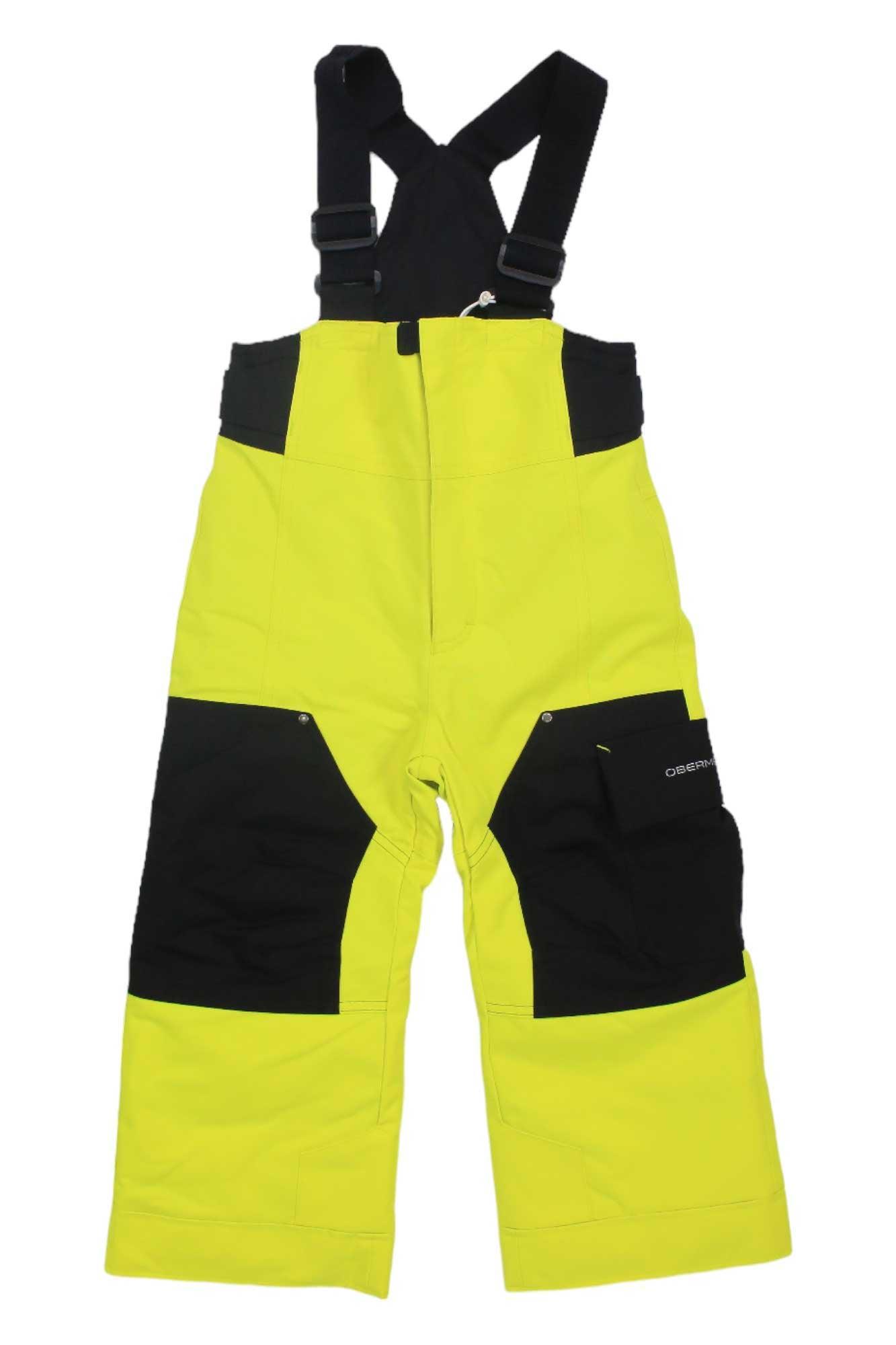 The Obermeyer Boys Volt Pant features bright yellow and black colors, waterproof insulation, adjustable waist, and reinforced knees, making these ski pants ideal for boys’ outdoor winter activities.