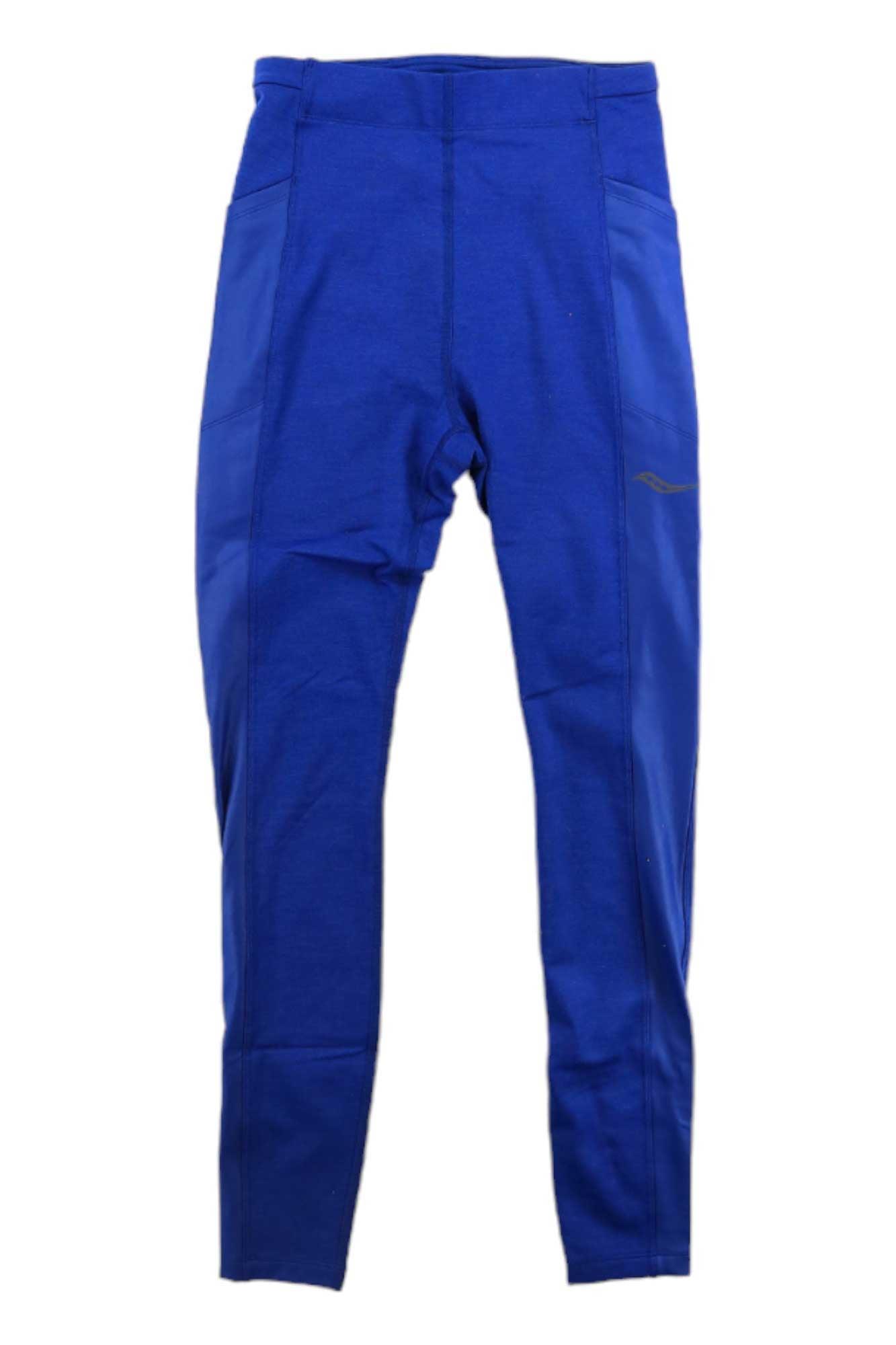 The Saucony Women's Solstice Tight features a bright blue color, high waistband, fitted legs, subtle side panels, a small upper thigh logo, and reflective detailing for visibility.