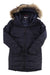 The Outdoor Research Women's Coze Faux Fur Parka is a black, quilted down coat with a zippered front and hood trimmed in brown faux fur, shown on a white background.