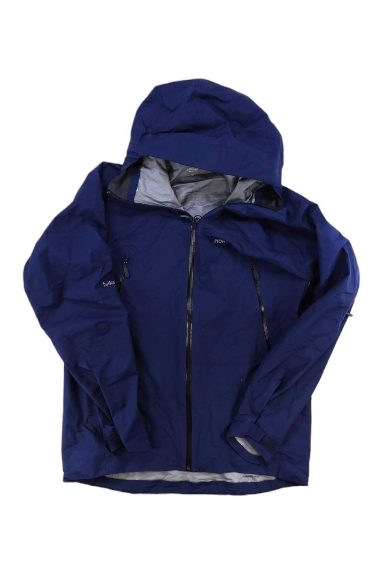 The Norrona Mens Falketind GTX Jacket, a dark blue mountaineering jacket with a hood, front zipper, long sleeves, and relaxed fit for men, is displayed flat on a white background.