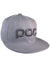 The POC Sports Juniors Corp Cap is gray with an adjustable snapback, flat brim, and features a bold black embroidered "POC" logo on the front.