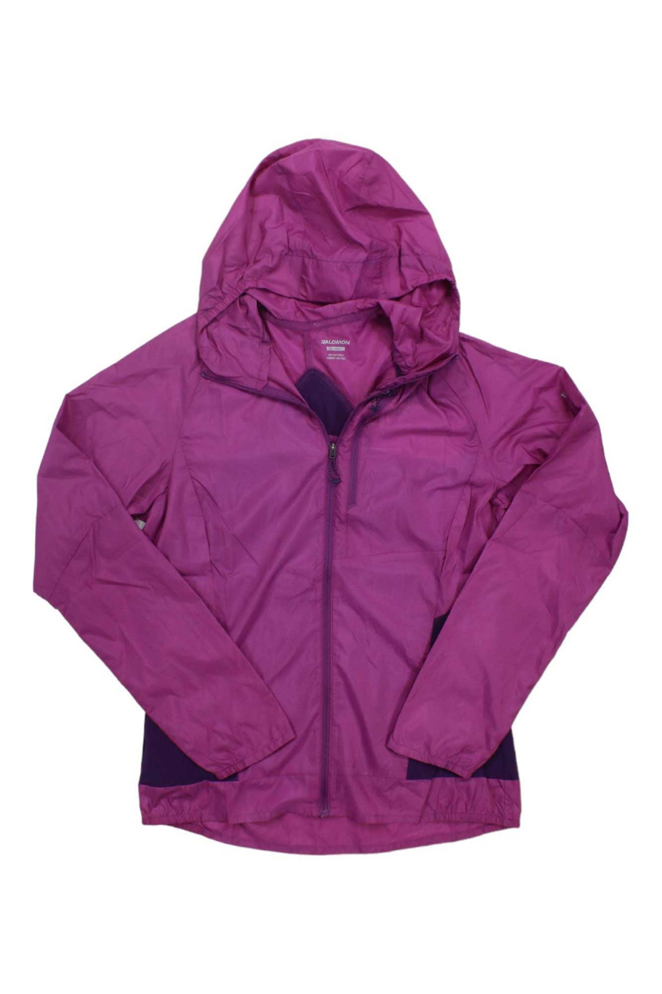 The Salomon Womens Bonatti Cross Full Zip Hoodie is a lightweight, long-sleeved magenta wind jacket with a front zipper for breathable protection, shown flat on a white background.