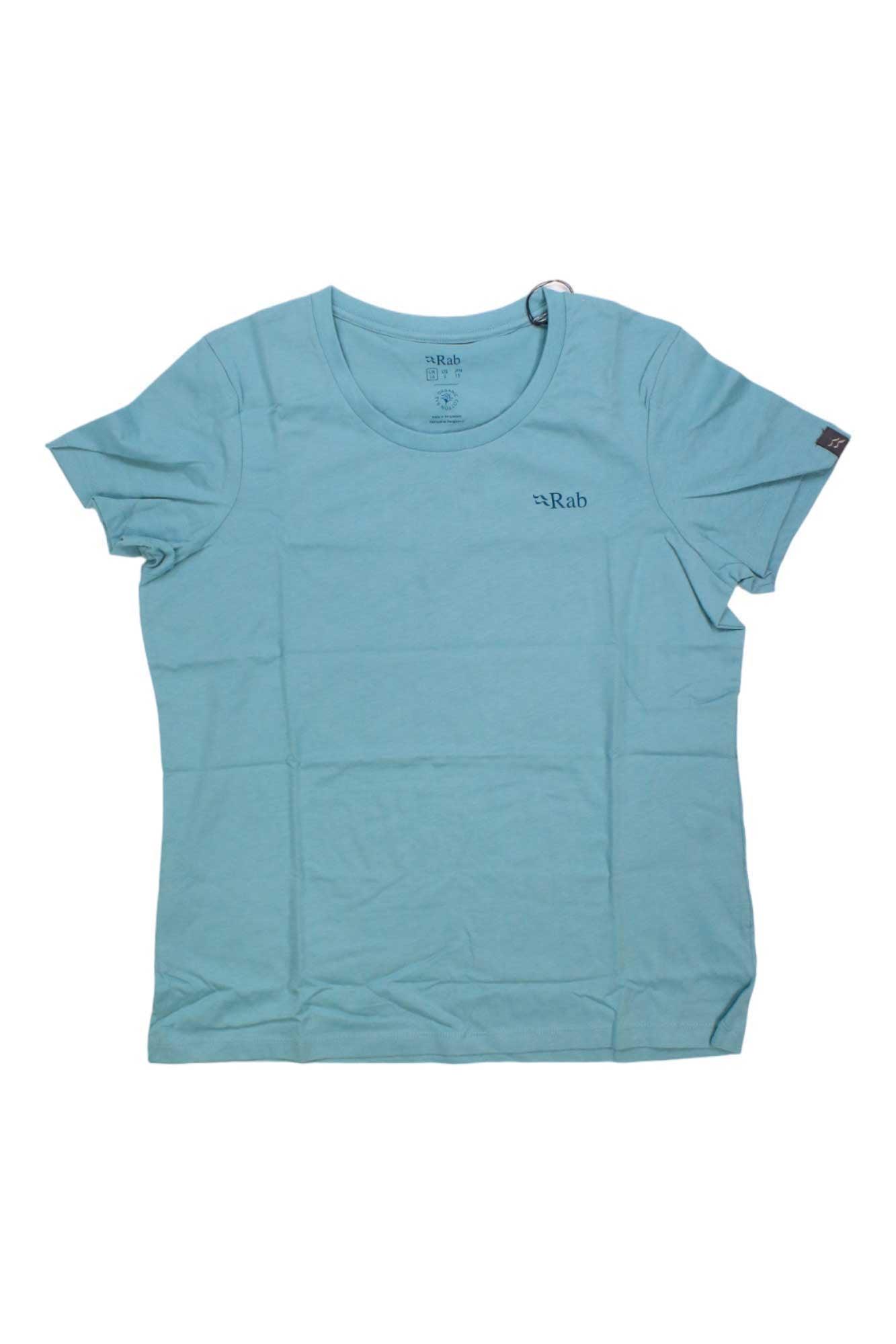 The Rab Women's Stance Mountain Peak Tee is a light blue, short-sleeve organic cotton shirt with a round neckline, Rab logo on the left chest, and a sleeve tag—ideal as a travel tee for women. Shown laid flat on a white background.