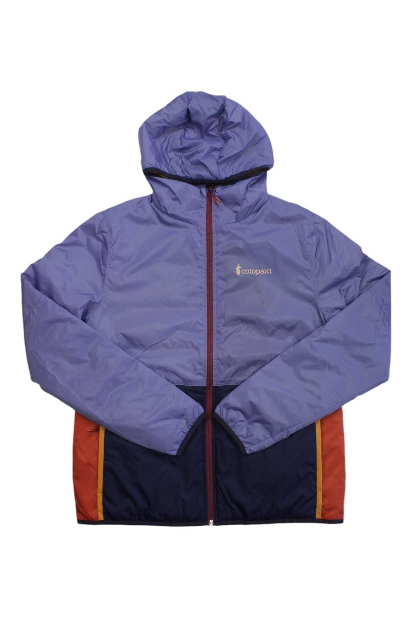 The Cotopaxi Womens Teca Calido Hooded Jacket is a lightweight, reversible, and sustainable insulated jacket with a purple top, dark blue bottom, orange and yellow accents, front zipper, and Cotopaxi logo on the left chest.