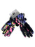 The Spyder Girls Synthesis Ski Glove features a colorful geometric pattern in blue, pink, yellow, and black, Primaloft insulation for warmth, a small spider logo, and attached product tags.