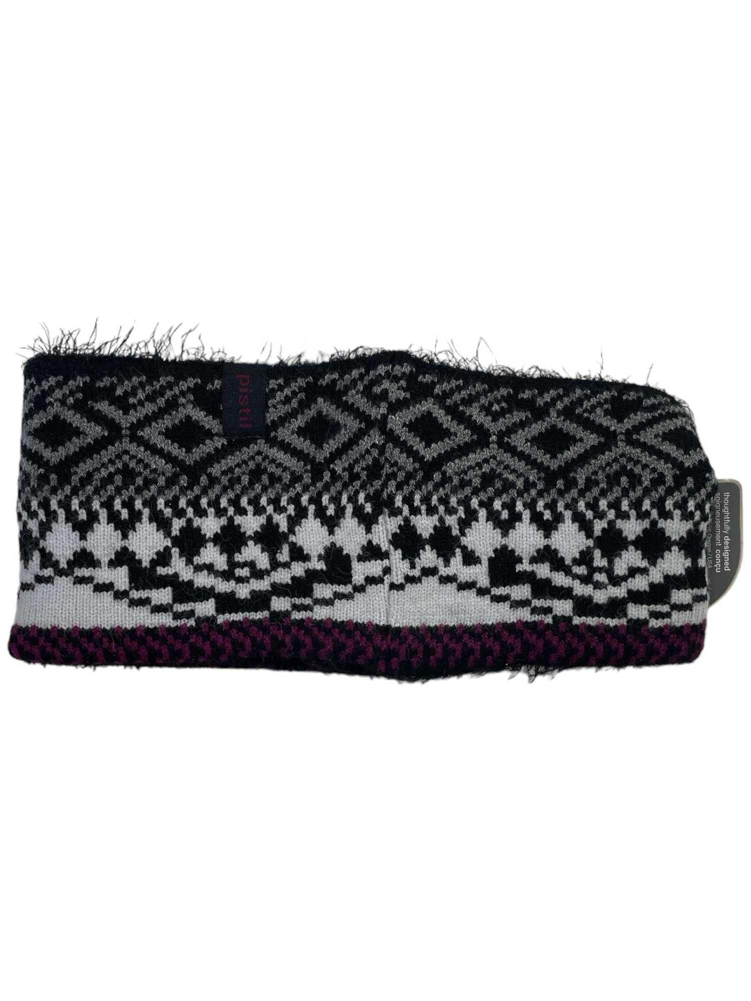 The Pistil Womens Isabetta Headband features black-and-white geometric and snowflake patterns, a fuzzy chenille-edge lining, and a touch of maroon on the bottom trim—making it a cozy and stylish travel accessory.
