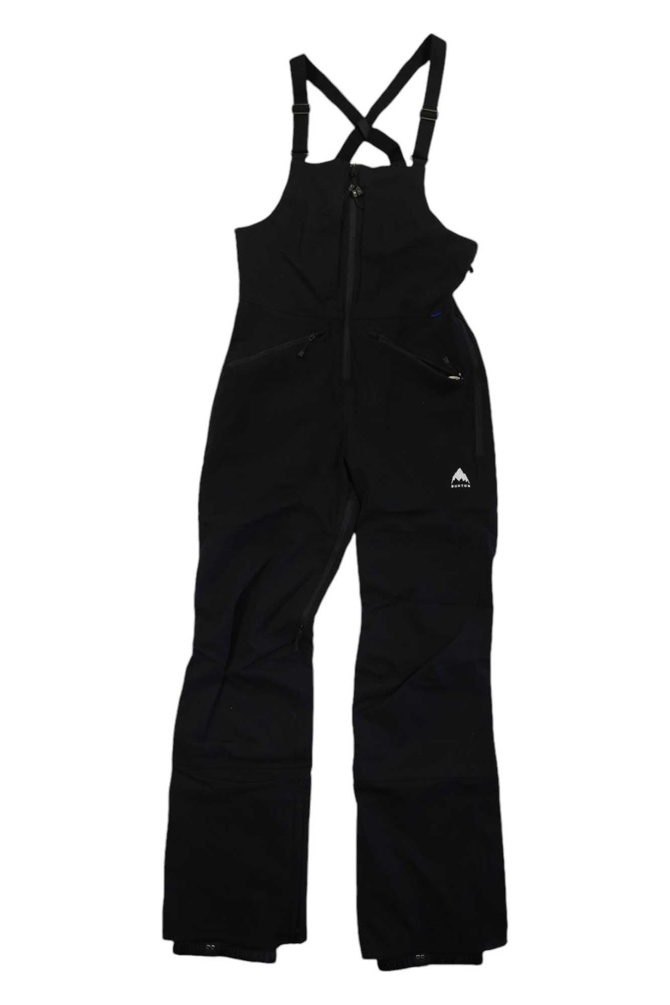 The Burton Womens Reserve Stretch 2L Bib Pant is made with DRYRIDE stretch fabric, featuring adjustable straps, front zip, two chest pockets, a white logo on the left leg, and reinforced knees and ankles for waterproof snowboarding.