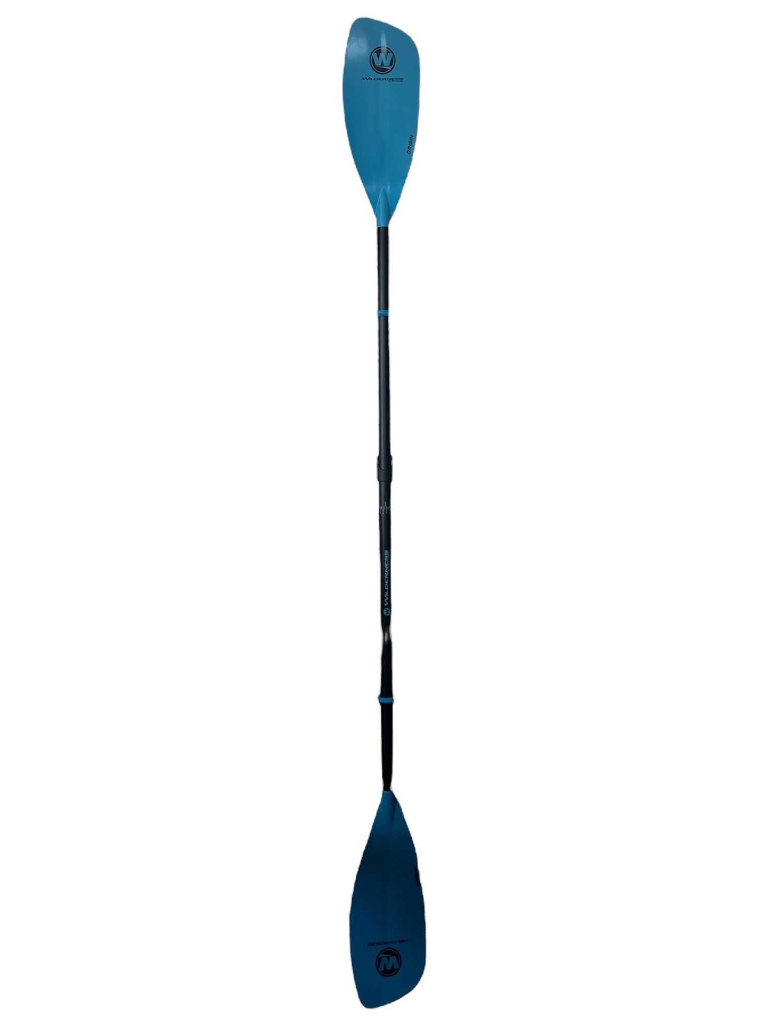 The Wilderness Systems Origin Touring Glass Paddle features a blue adjustable design with fiberglass reinforced blades and a black shaft, displayed vertically on a white background.