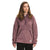 A woman wearing The North Face Women's Campshire Pullover Hoodie 2.0 in mauve, featuring fuzzy Sherpa fleece, a partial zipper, and a front pocket, stands facing forward with a neutral expression against a plain background.