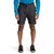 A person wearing a bright blue long-sleeve shirt, The North Face Men's Project 8 Inch Short, and black sneakers stands against a white background, visible from shoulders to feet.