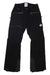A pair of Mammut Womens Stoney HS Pants in black, featuring waterproof fabric, zippered pockets, reinforced knees, and a white logo on the upper left leg. Designed for rugged use, they are laid flat on a white background.