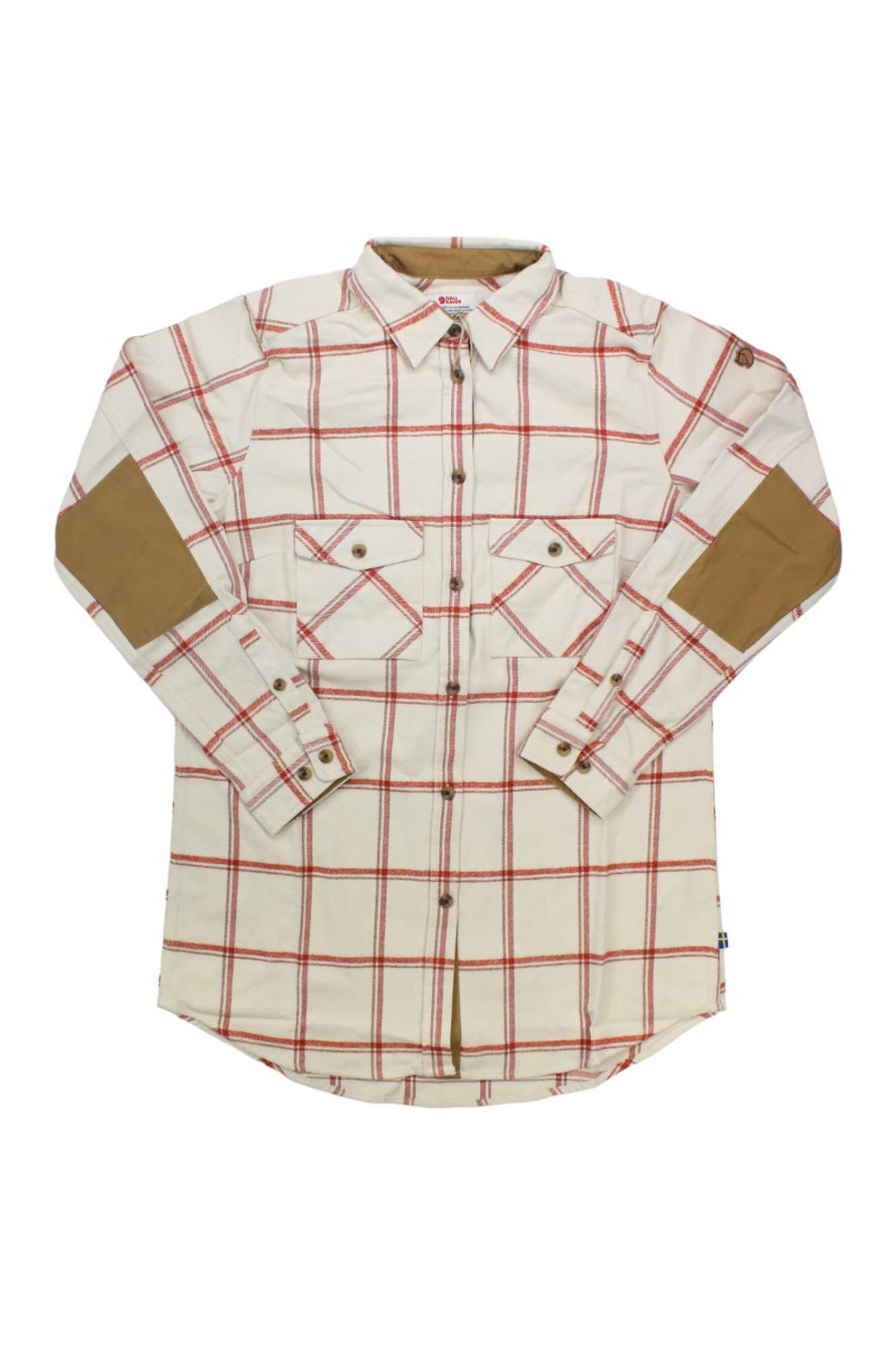 The Fjallraven Womens Ovik Twill LS Shirt is a cream plaid cotton-blend shirt with red checks, brown elbow patches, two chest flap pockets, and a curved hem for timeless style.