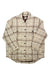 The Tentree Women's Kapok Flannel Insulated Shacket features a beige and brown plaid design, long sleeves, a collar, and two buttoned chest pockets. Made from recycled materials, it's laid flat on a white background for an eco-conscious look.