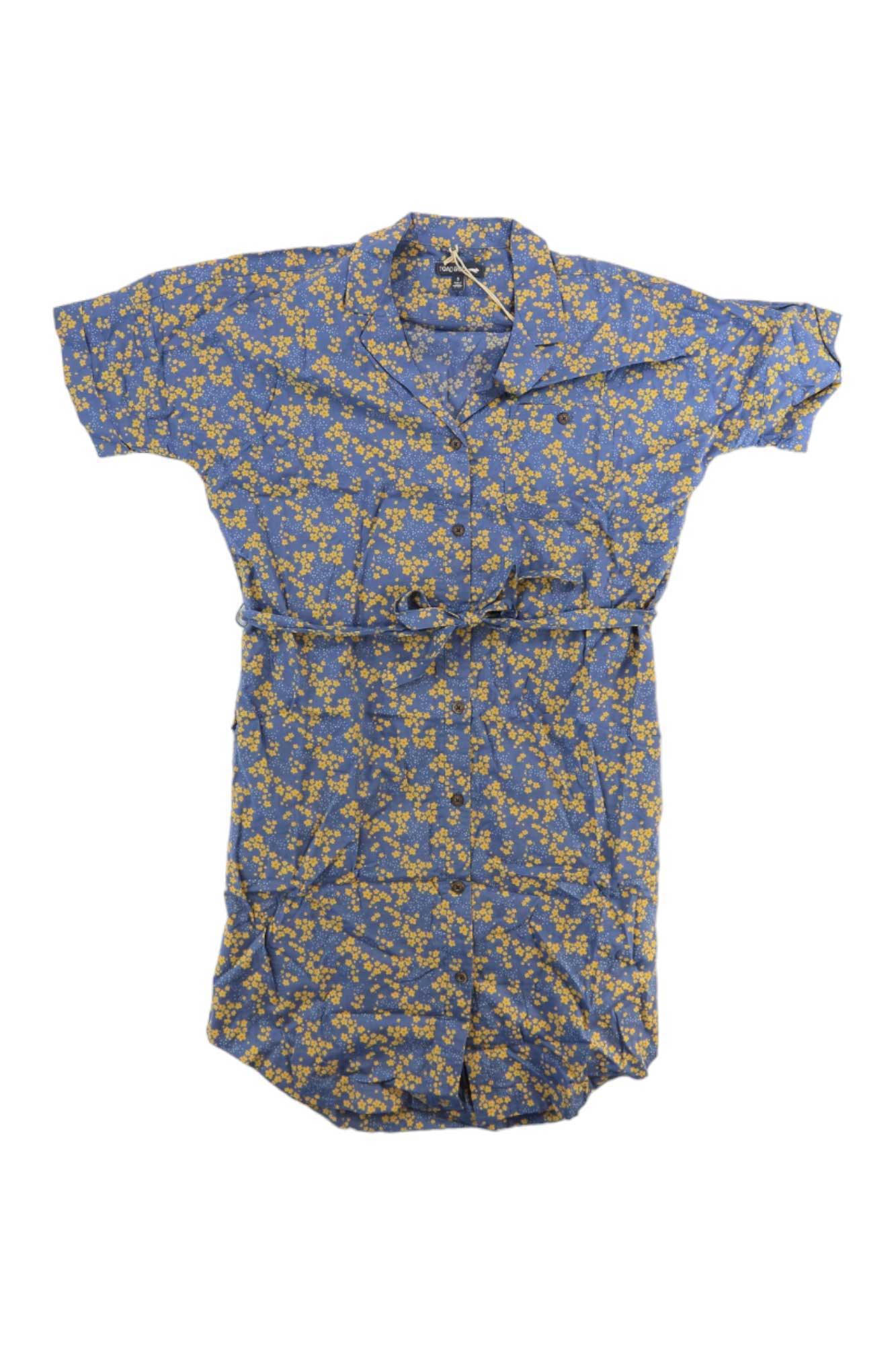 The Toad & Co Women's Willet SS Shirtdress is a short-sleeved, knee-length blue dress with a yellow floral print, button-down front, collar, and matching belt made from organic cotton, shown laid flat on a white background.