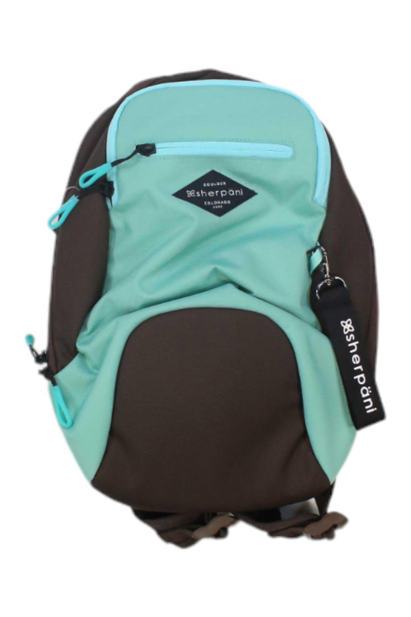 The Sherpani Women's Vespa Backpack has aqua blue and brown panels, a front zip pocket, RFID-protected storage, the diamond Sherpani logo, a black keychain tag with white text, and is crafted from recycled materials.