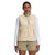 A person stands facing forward, wearing The North Face Women's Cragmont Fleece Vest over a white long-sleeve shirt and khaki shorts, against a plain white background.