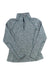 The Spyder Women's Accord 1/2 Zip Top is a heather gray long-sleeve performance fleece pullover with a mock turtleneck collar, ideal as a base layer for warmth, shown laid flat on a white background.