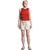 A woman with light skin and blonde hair faces forward, wearing a red sleeveless tank, The North Face Women's Motion Pull-On 4 Inch Shorts in beige, and beige sandals. She gazes slightly to the side.