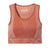 The Smartwool Womens Intraknit Racerback Bra is rust-colored, sleeveless, and seamless, crafted from a merino wool blend with a scoop neckline, subtle side patterns, and the Smartwool logo printed inside the back.