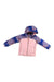 The Spyder Toddler Girls Conquer Jacket has a light pink body, patterned blue sleeves and hood, helmet-compatible hood, front zipper, colorful dotted design, and warm PrimaLoft insulation for extra comfort.