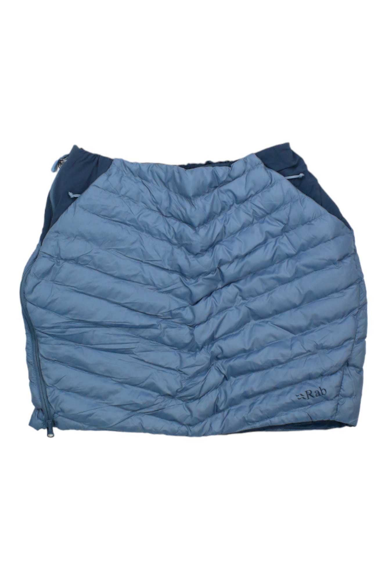 The Rab Women's Cirrus Skirt is a blue insulated skirt featuring Primaloft fill, horizontal stitching, side zippers, and the Rab logo embroidered on the lower right corner.