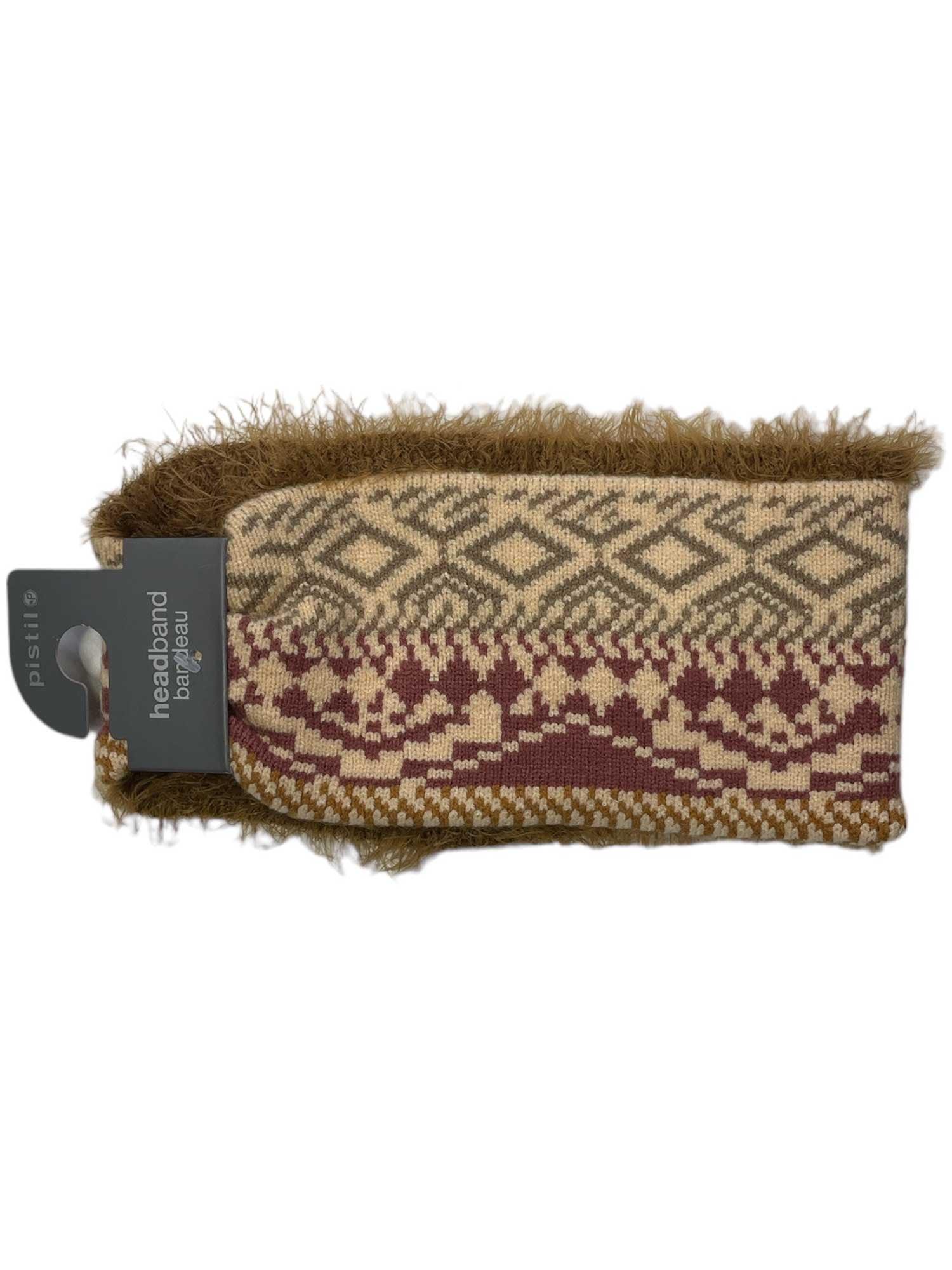 The Pistil Womens Isabetta Headband features a geometric beige, brown, and red design with cozy chenille-lined edges and a product tag—ideal for stylish travel.