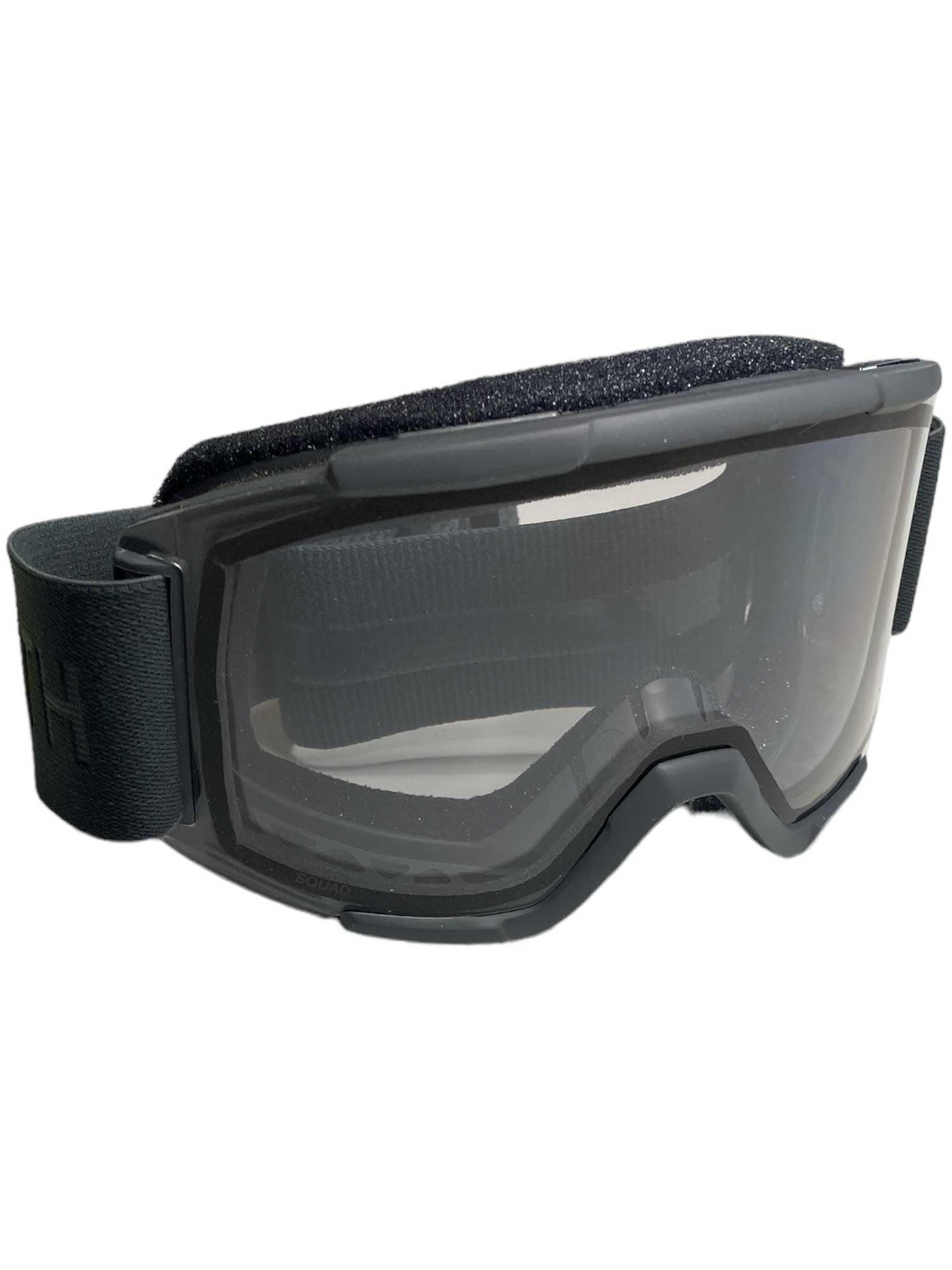 The Smith Squad Snow Goggle features a clear anti-fog lens, black frame, and adjustable elastic strap, making it ideal for safety or sports use.